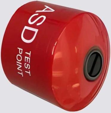 Tesztelő pont piros ABS 25mm átmérővel. Olyan furat, amely a rendszer normál működése során zárva marad, és csak a tesztelés során nyitják ki.